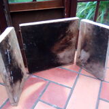 White veined black marble fireplace