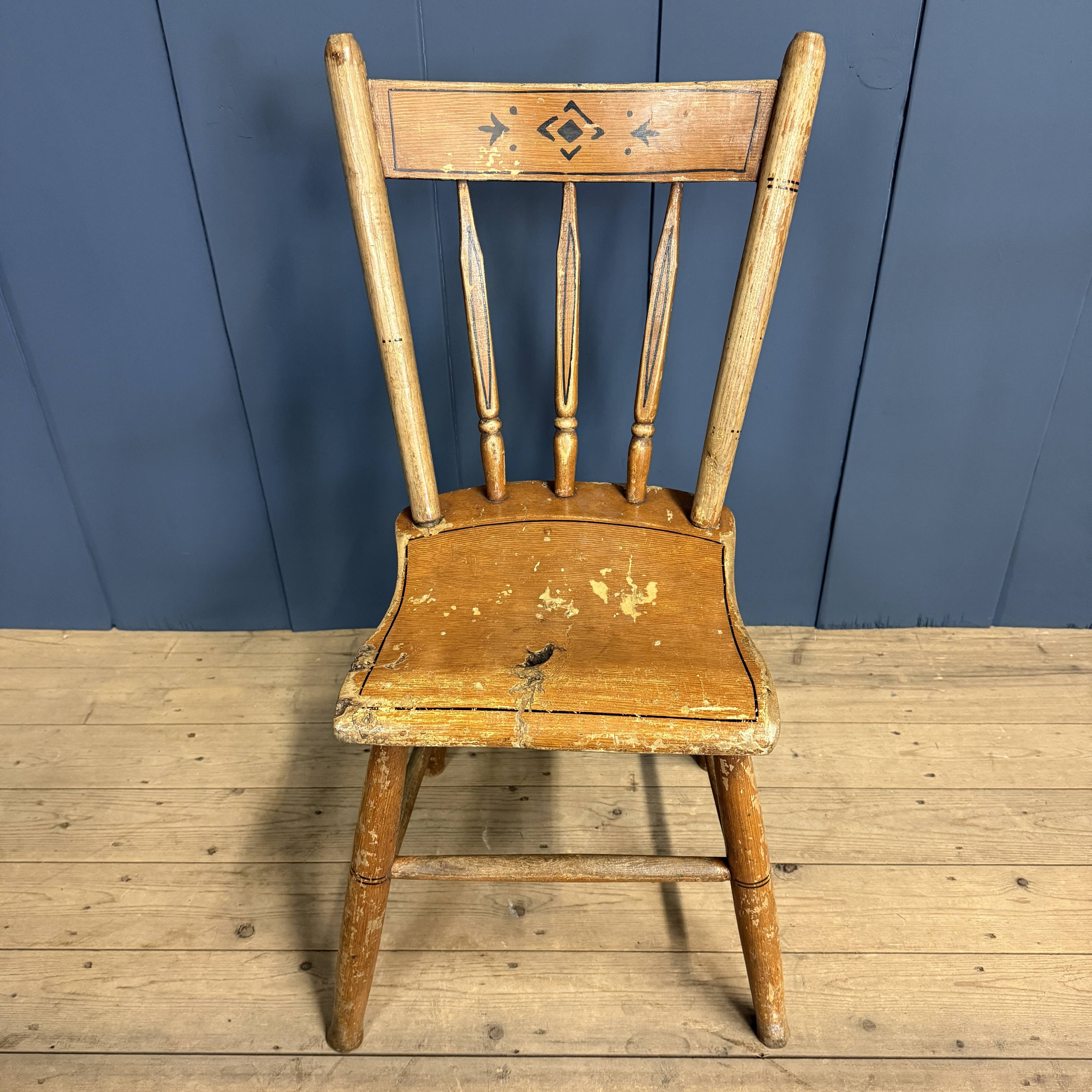 Set of four painted Dutch kitchen chairs.