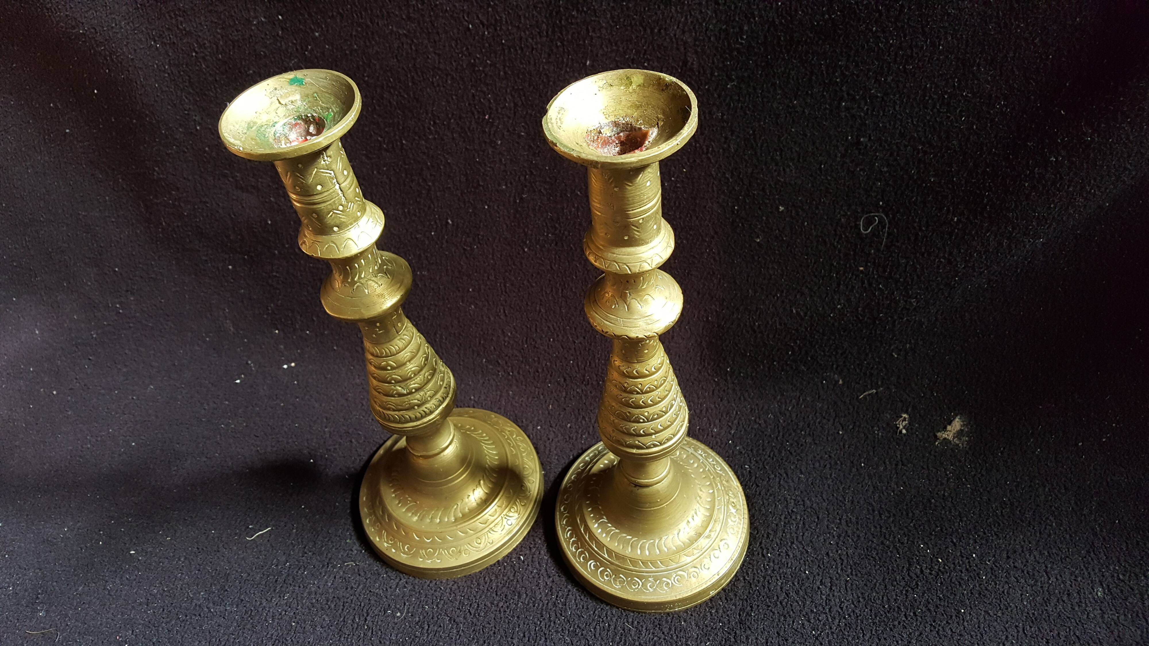 Former pair of bronze candlesticks