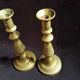 Former pair of bronze candlesticks