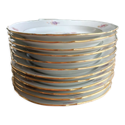 12 semi-hollow plates in Vierzon porcelain decorated with flowers and gilding