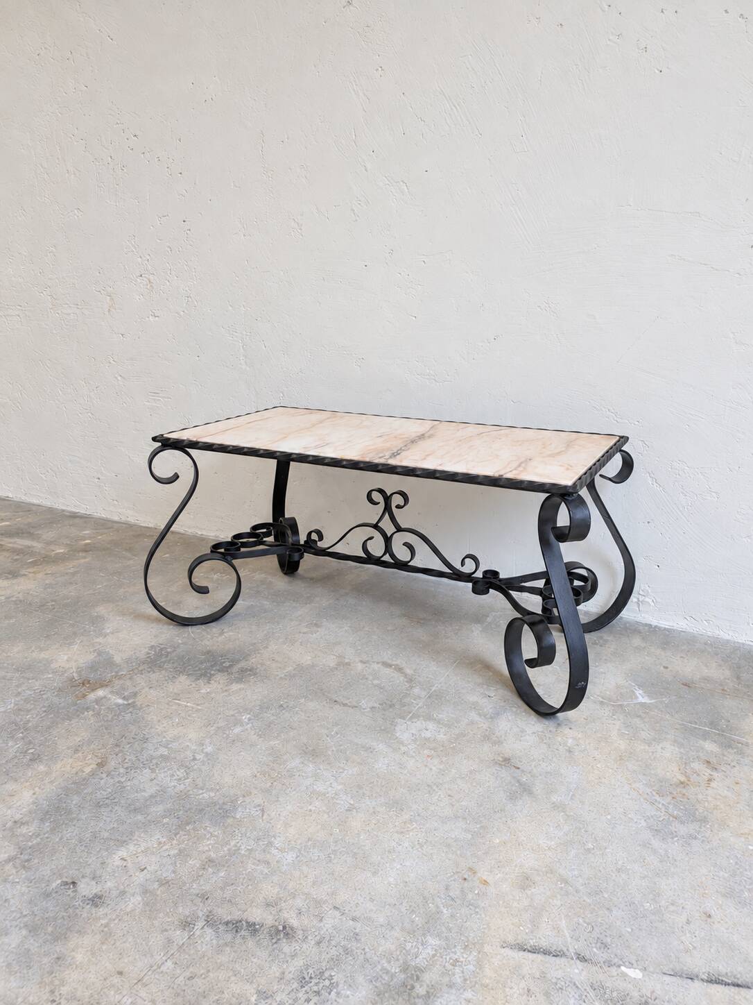Coffee table in marble and wrought iron, Mediterranean spirit.