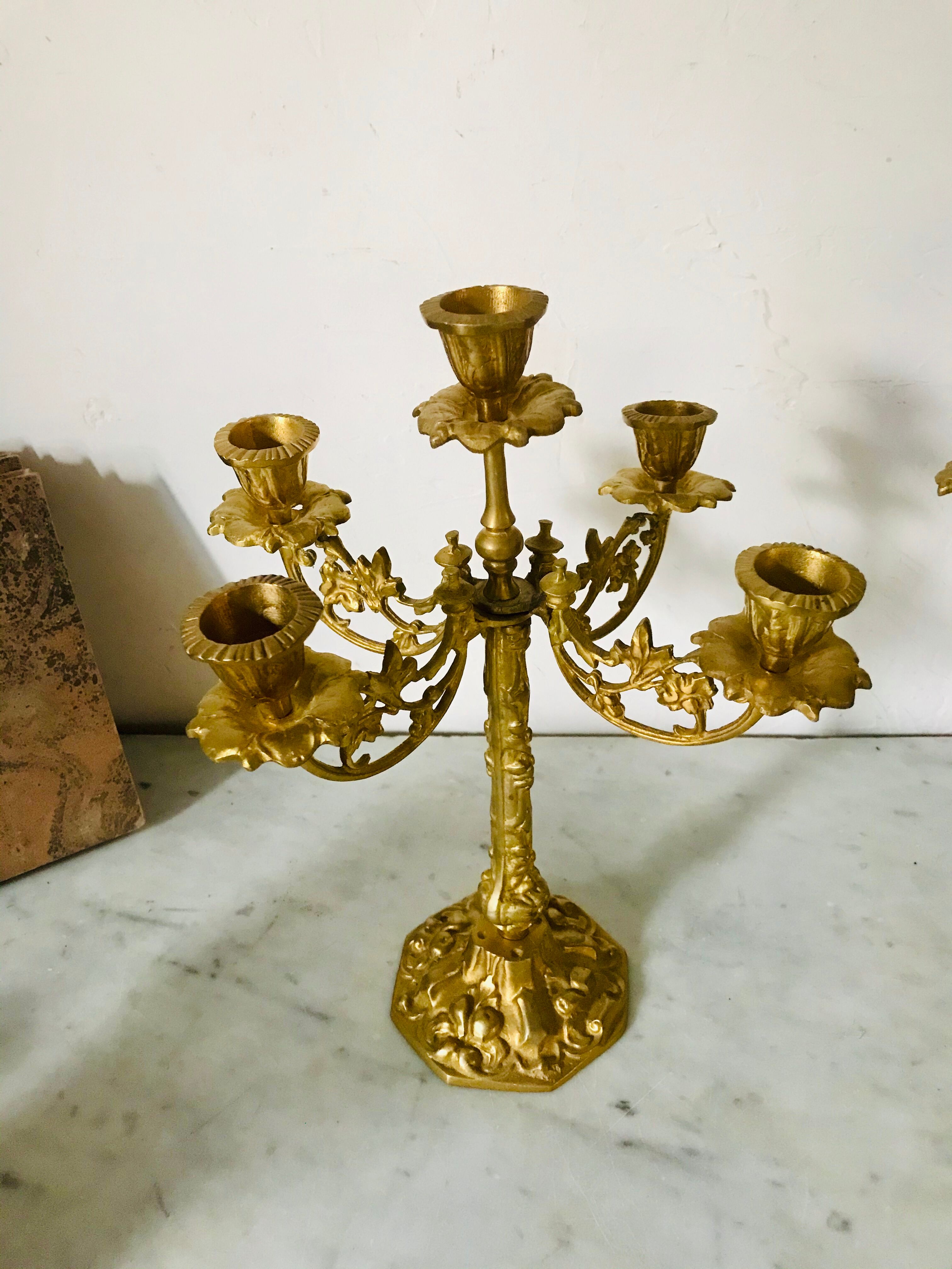 Pair of golden brass candlesticks