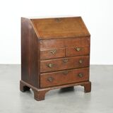 Antique English oak secretary from the 18th century with a stepped interior