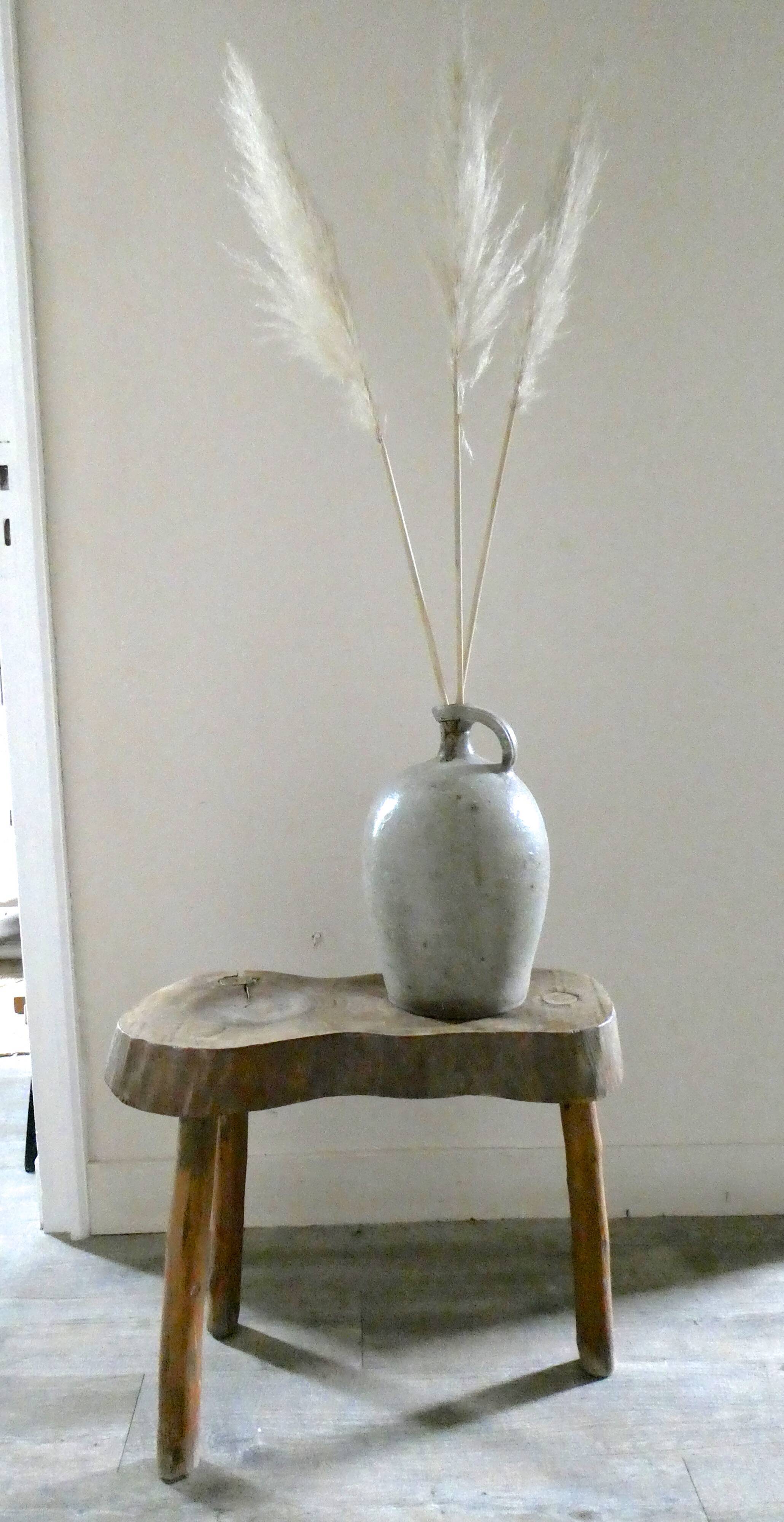 Old bonbonne in glazed stoneware