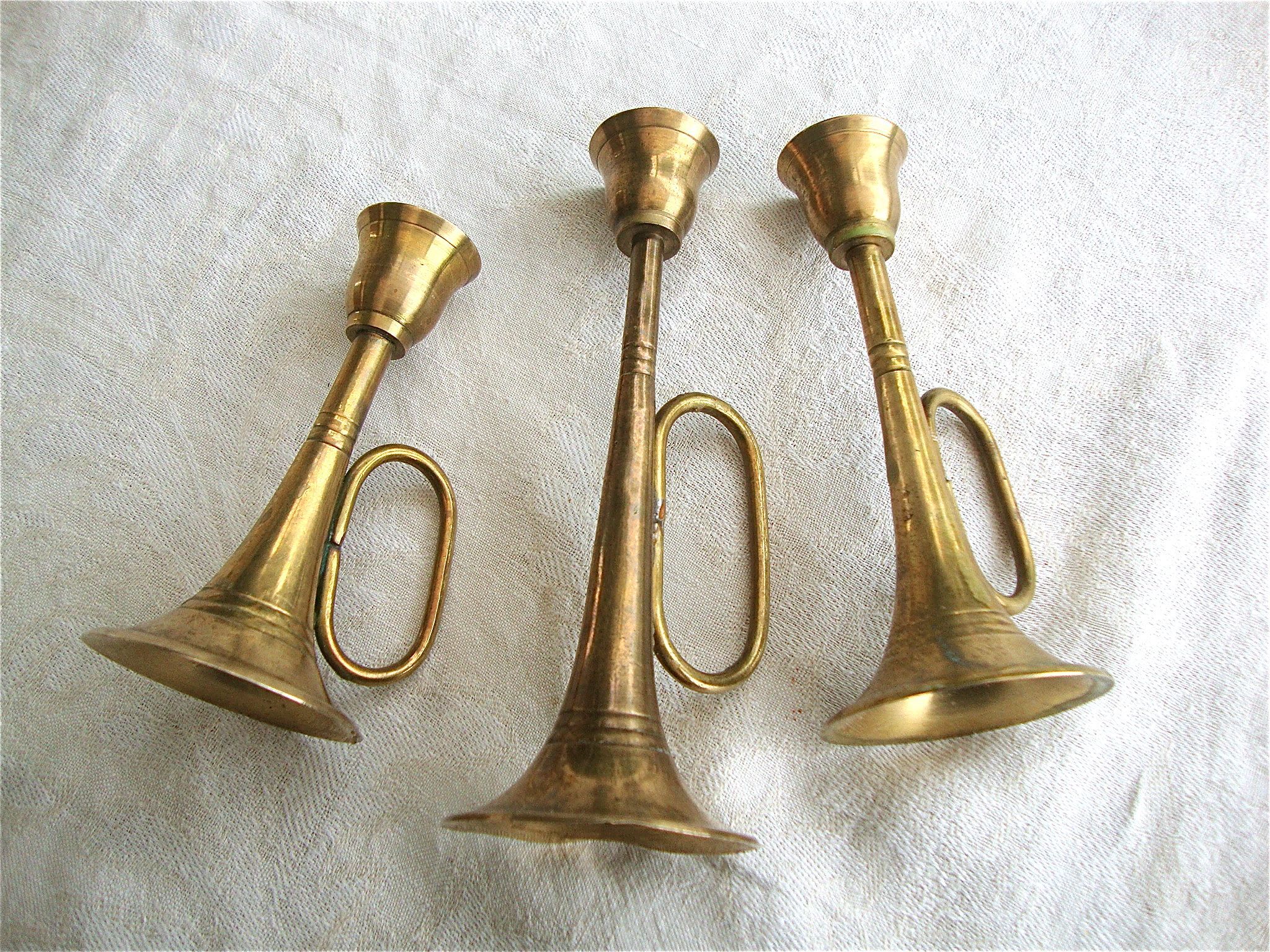 3 brass trumpet candlesticks