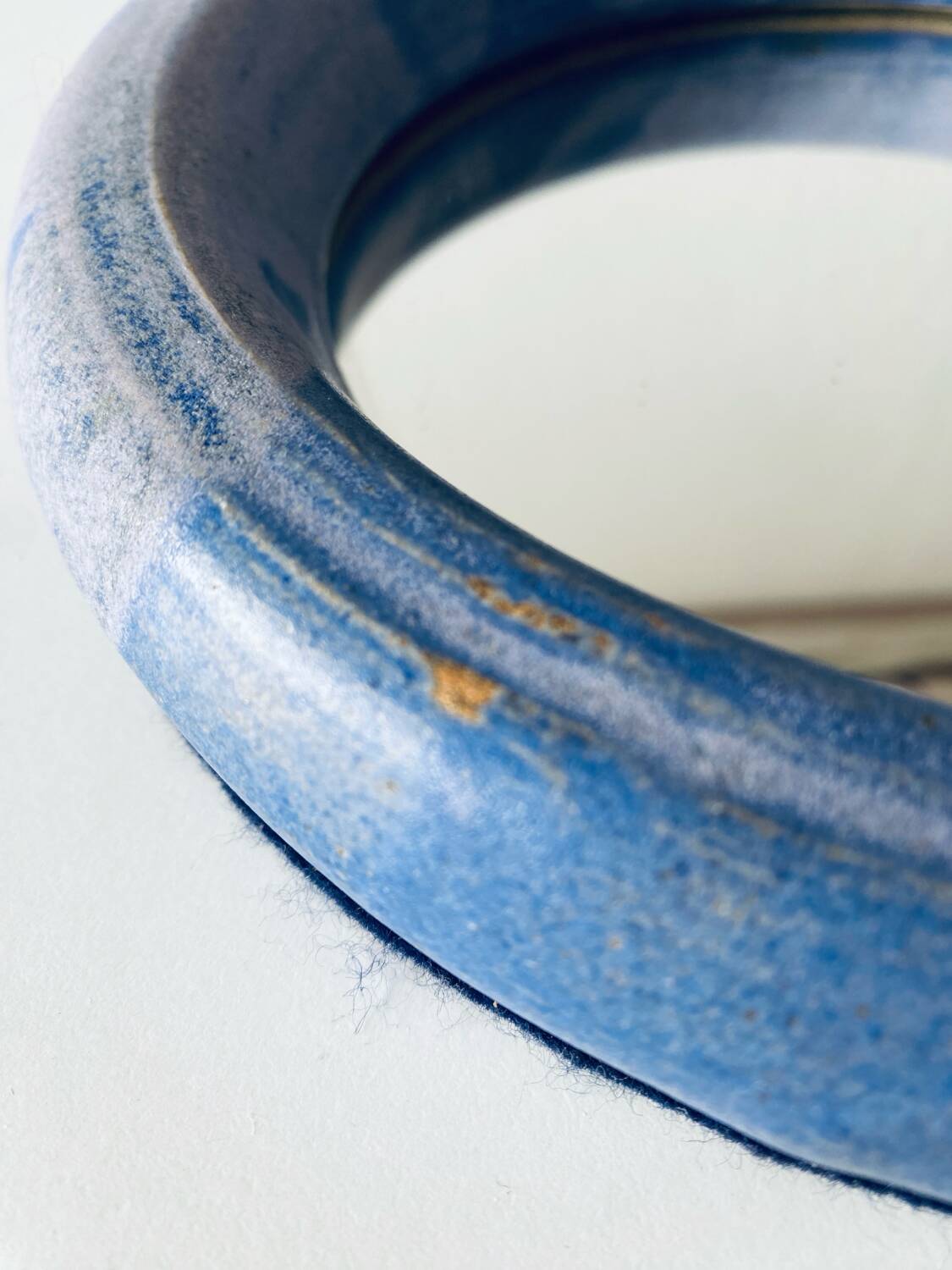 Round ceramic wall mirror