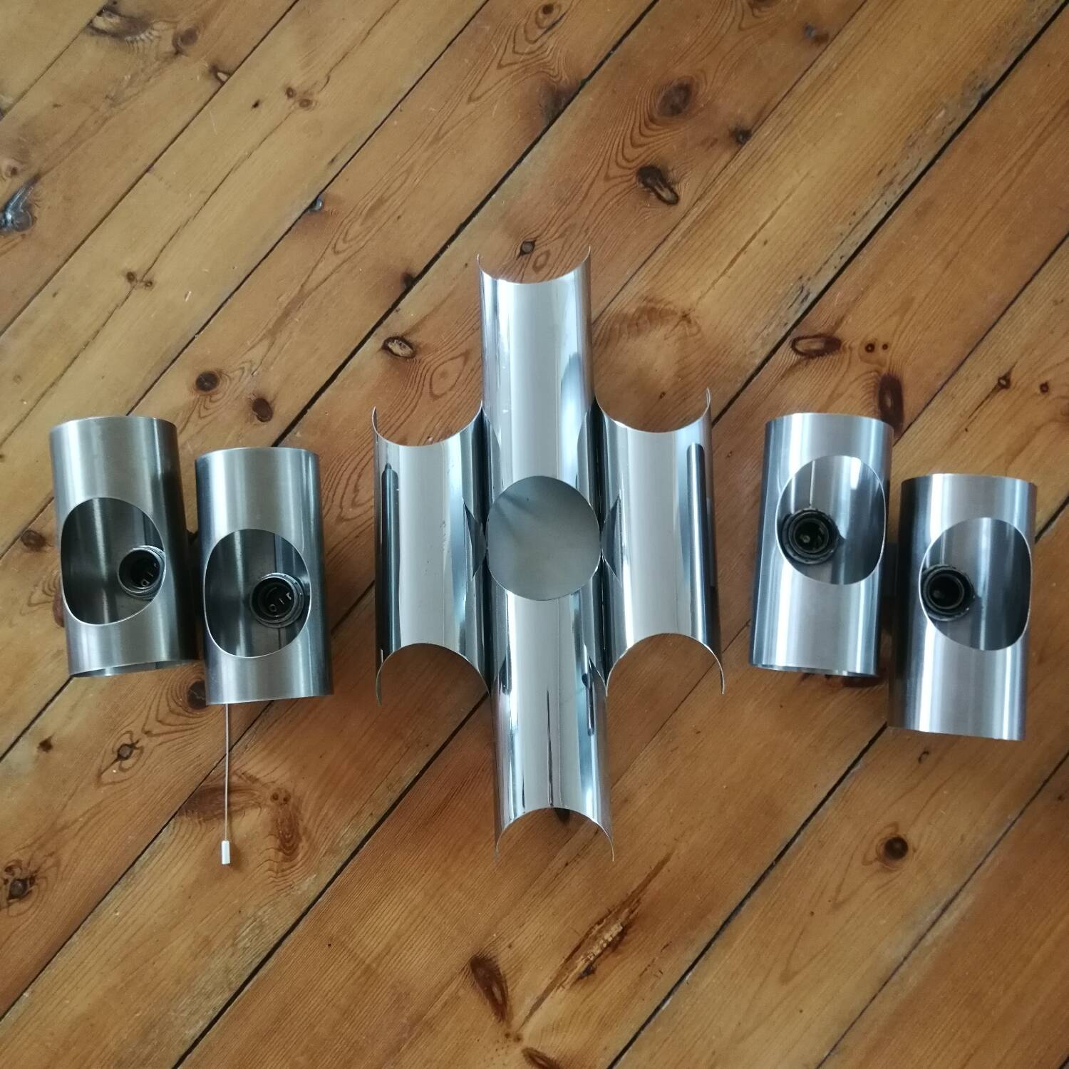 Set of Oxar brand wall lights in chromed steel