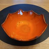 Orange ceramic star-shaped empty bowl