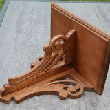 Openwork wooden wall shelf