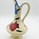 Vintage ceramic pitcher with floral decoration - 637023