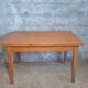1950s dining table with sliding extensions