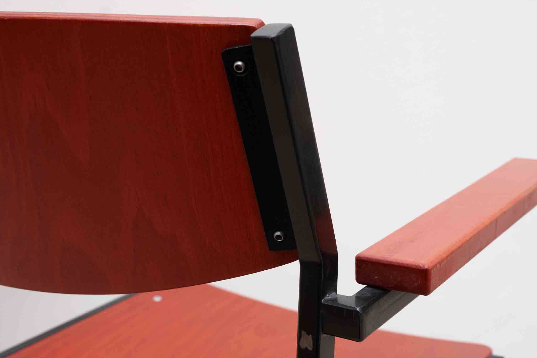 Gijs van der Sluis red and black chairs with armrests