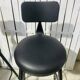 Pair of black bar stools in industrial and contemporary style.