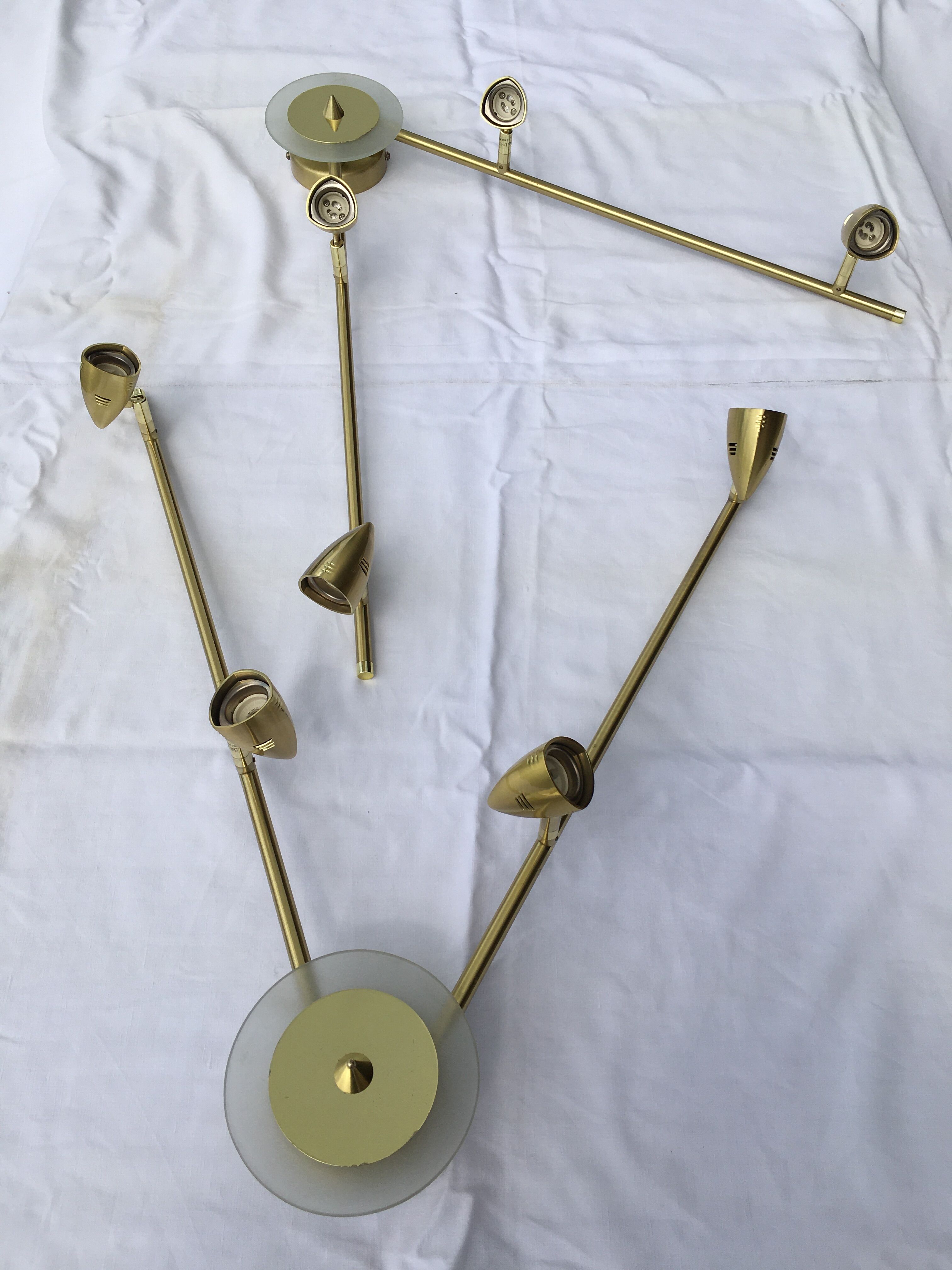 Pair of gold brass design sconces