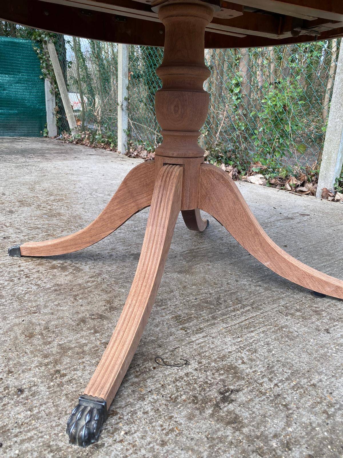Round extendable table in Empire style, renovated with Bordeaux leather and raw wood, 168cm.