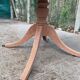 Round extendable table in Empire style, renovated with Bordeaux leather and raw wood, 168cm.