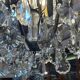Bronze and cut crystal chandelier with 6 lights, early 20th century work.