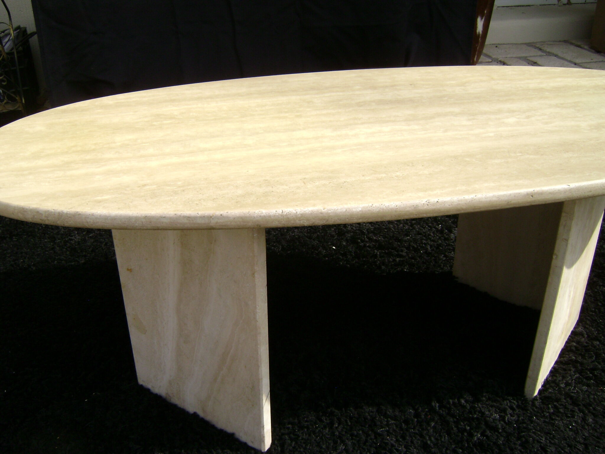 Oval coffee table in travertine italy from the 1970s