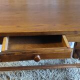 Table style farmhouse table in solid wood.