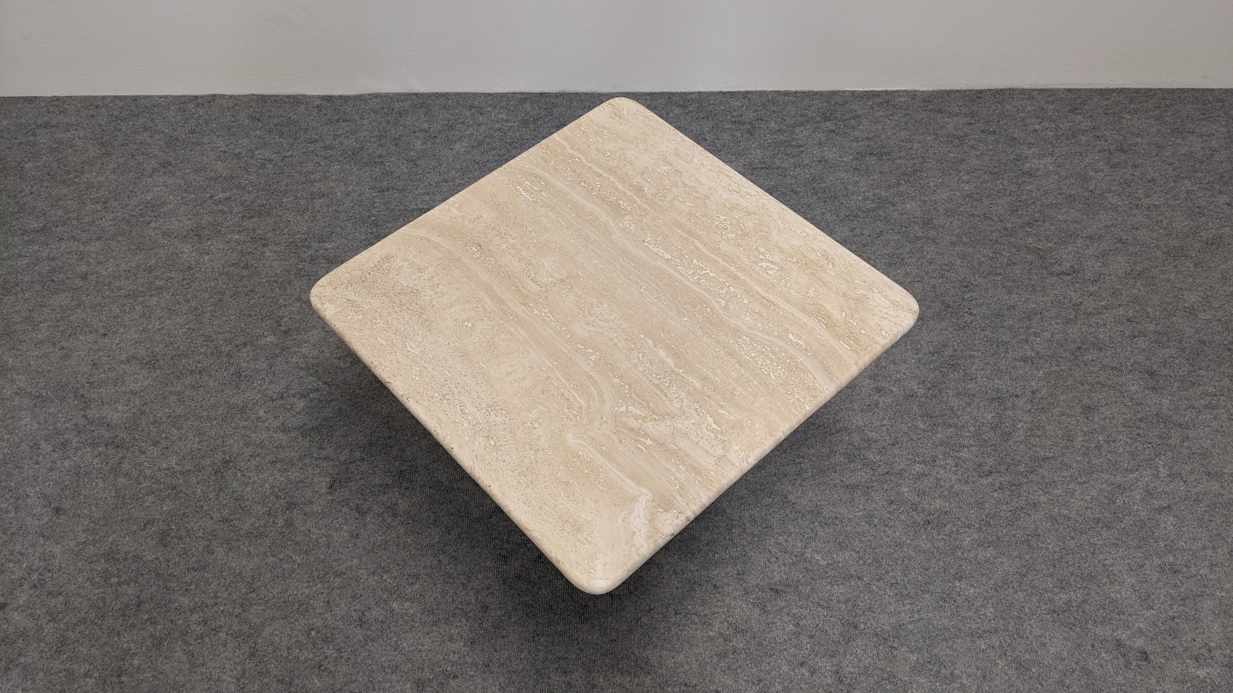 Coffee table or side table in travertine, Italy around 1970.