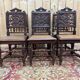 6 High Era chairs in carved solid oak and rattan caning.
