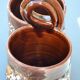 Double vase/porte couverts en céramique fat lava