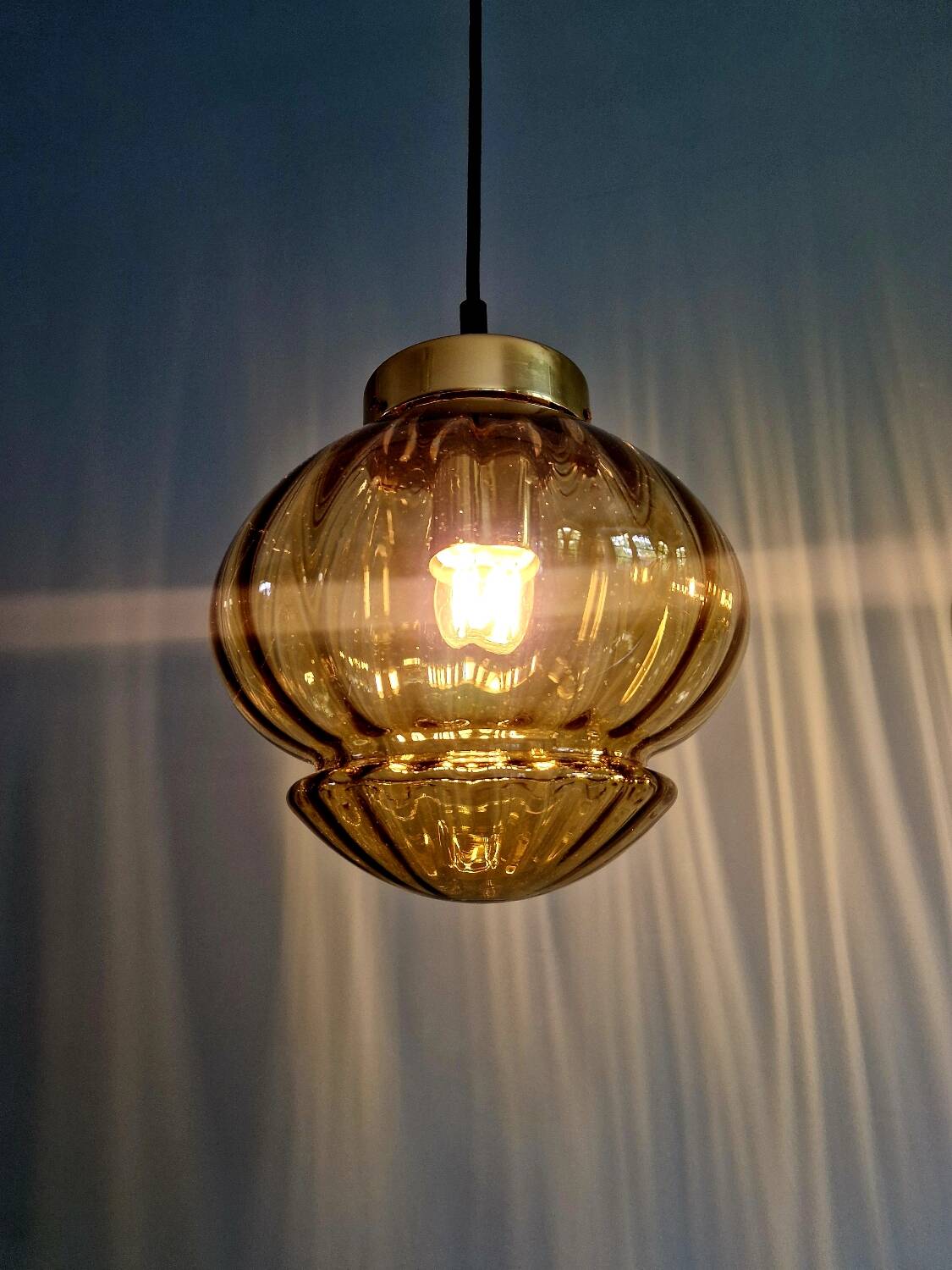 Set of 3 amber glass pendant lights, RAAK Amsterdam, 1970