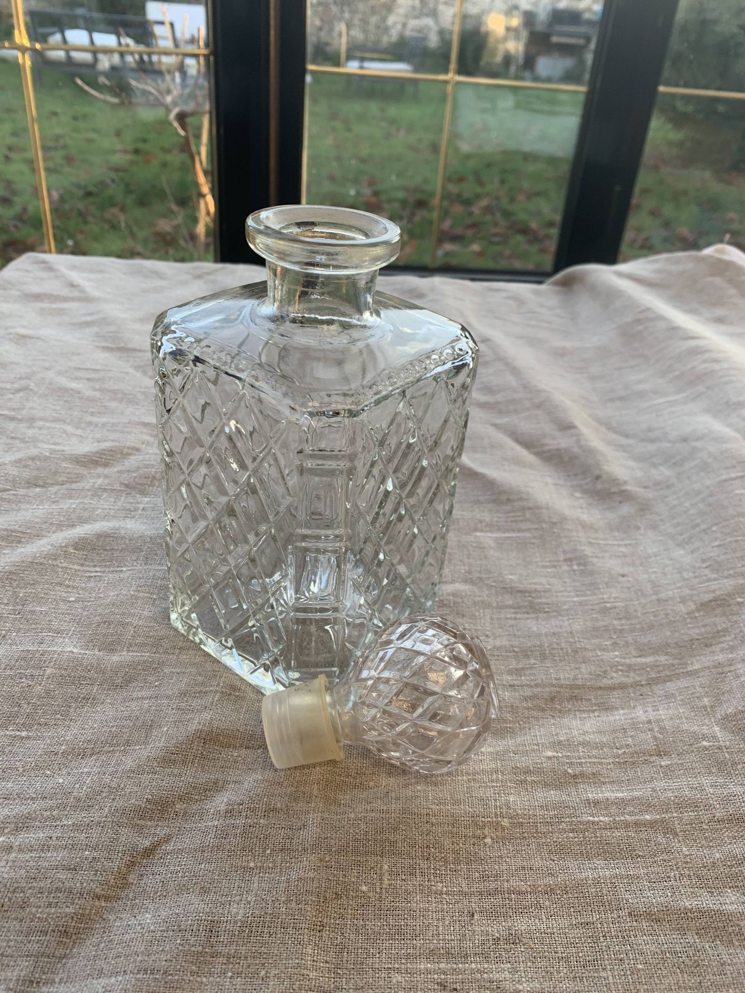 Vintage transparent molded glass whisky decanter