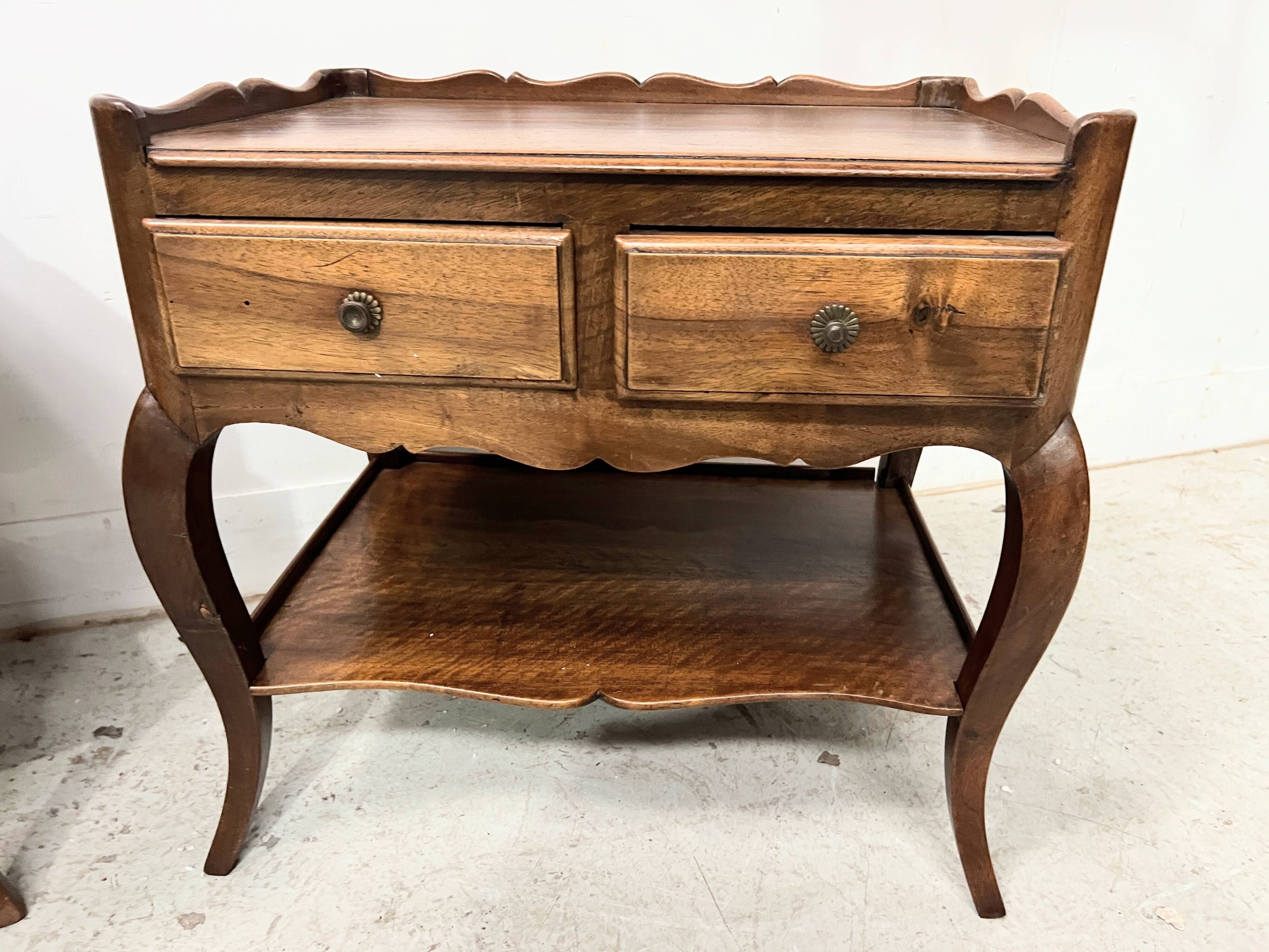 Louis XV style bedside table in solid walnut, 20th century.