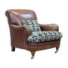 Fauteuil club anglais en cuir des années 90, assise et coussin en tissu PADDINGTON de chez CASAMANCE