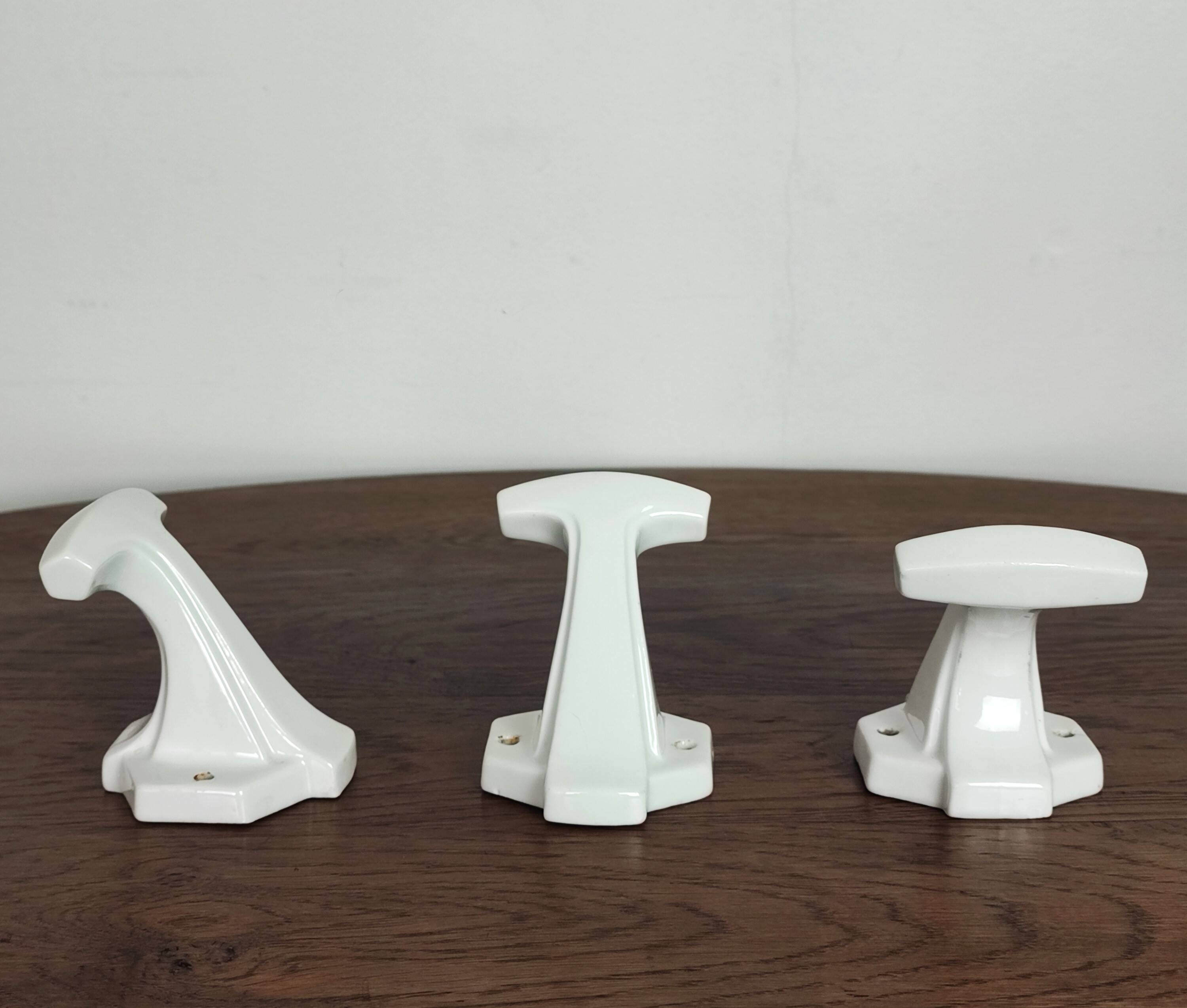 3 porcelain coat hooks