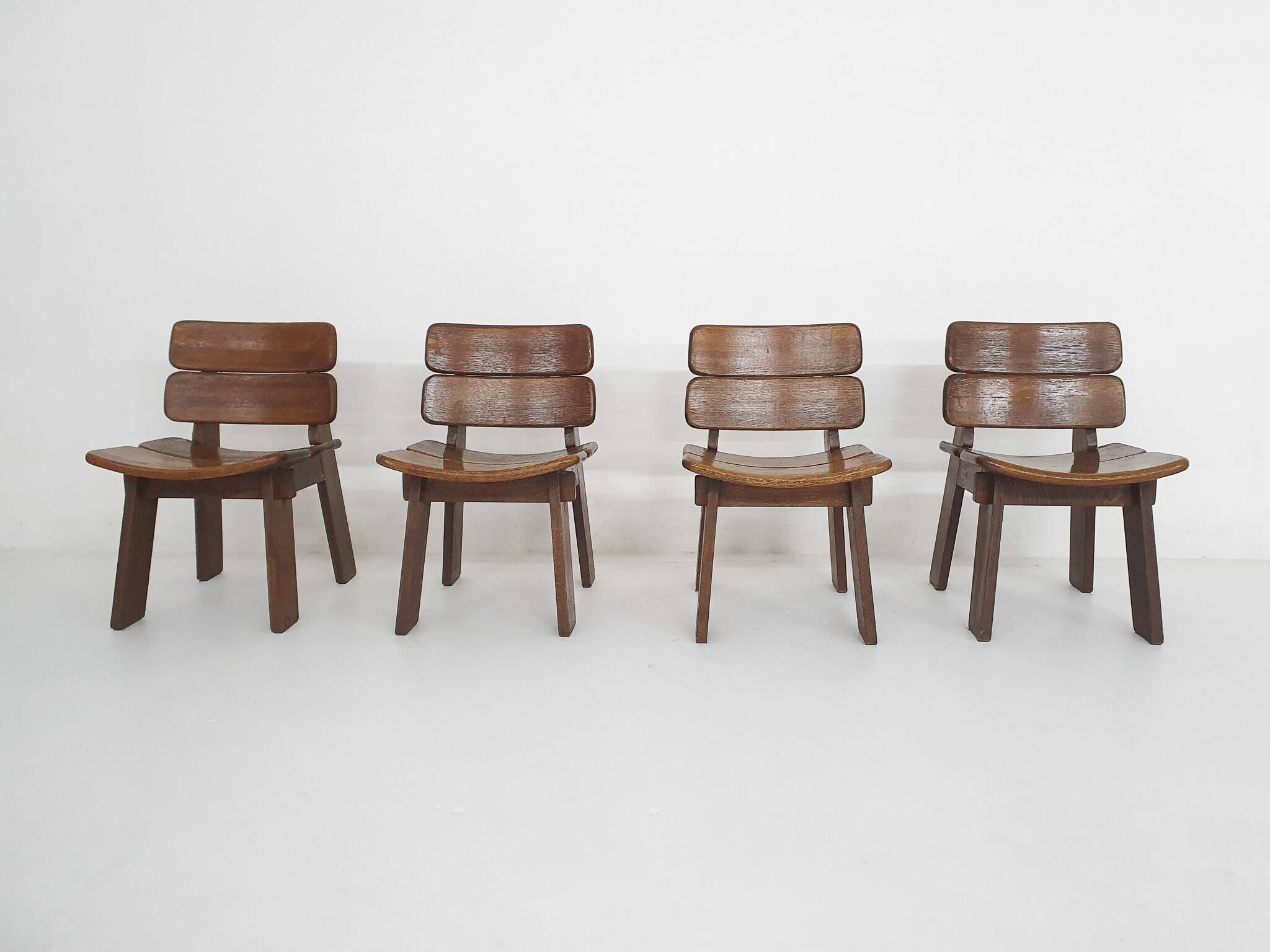 Set of four solid oak dining chairs, The Netherlands 1970's