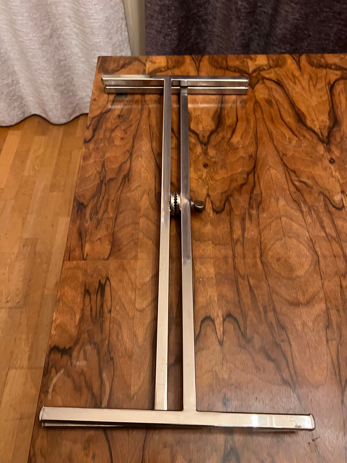 Small chrome and glass coffee table.