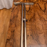 Small chrome and glass coffee table.