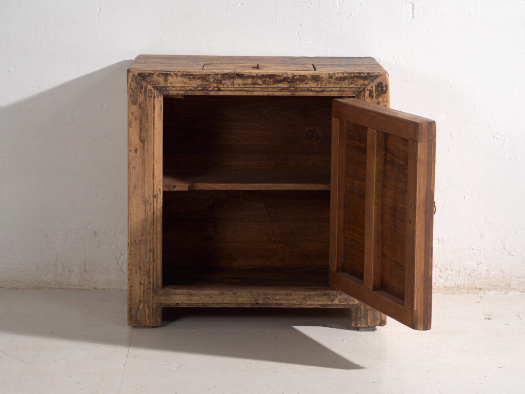 Low Shanxi cabinet in elm with carved door – China, circa 1930