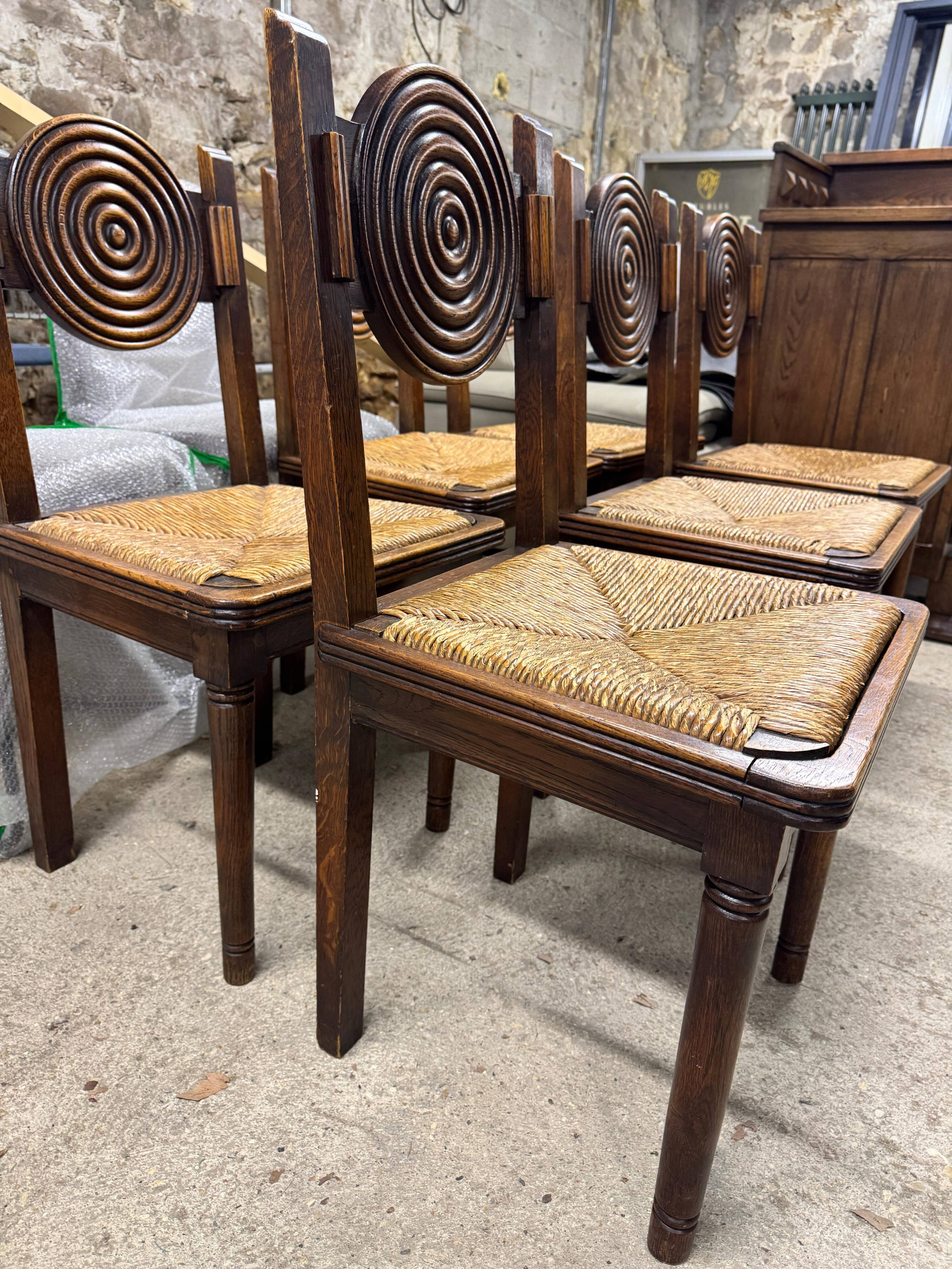 Oak chairs with straw seats in the spirit of charles douduyt