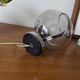 Wall light in chromed metal and smoked grey glass globe