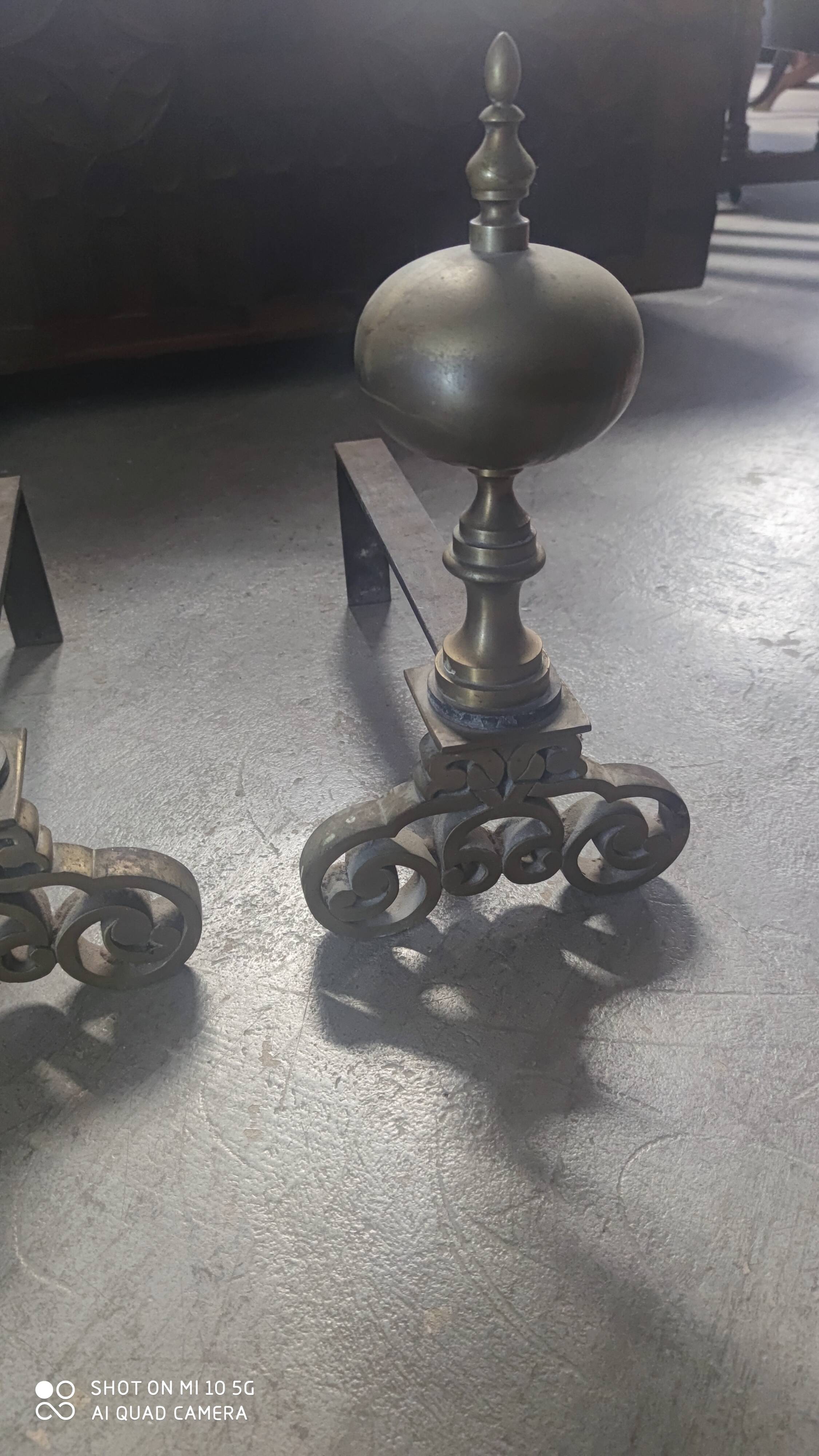 Pair of bronze and steel andirons, 19th century, Holland