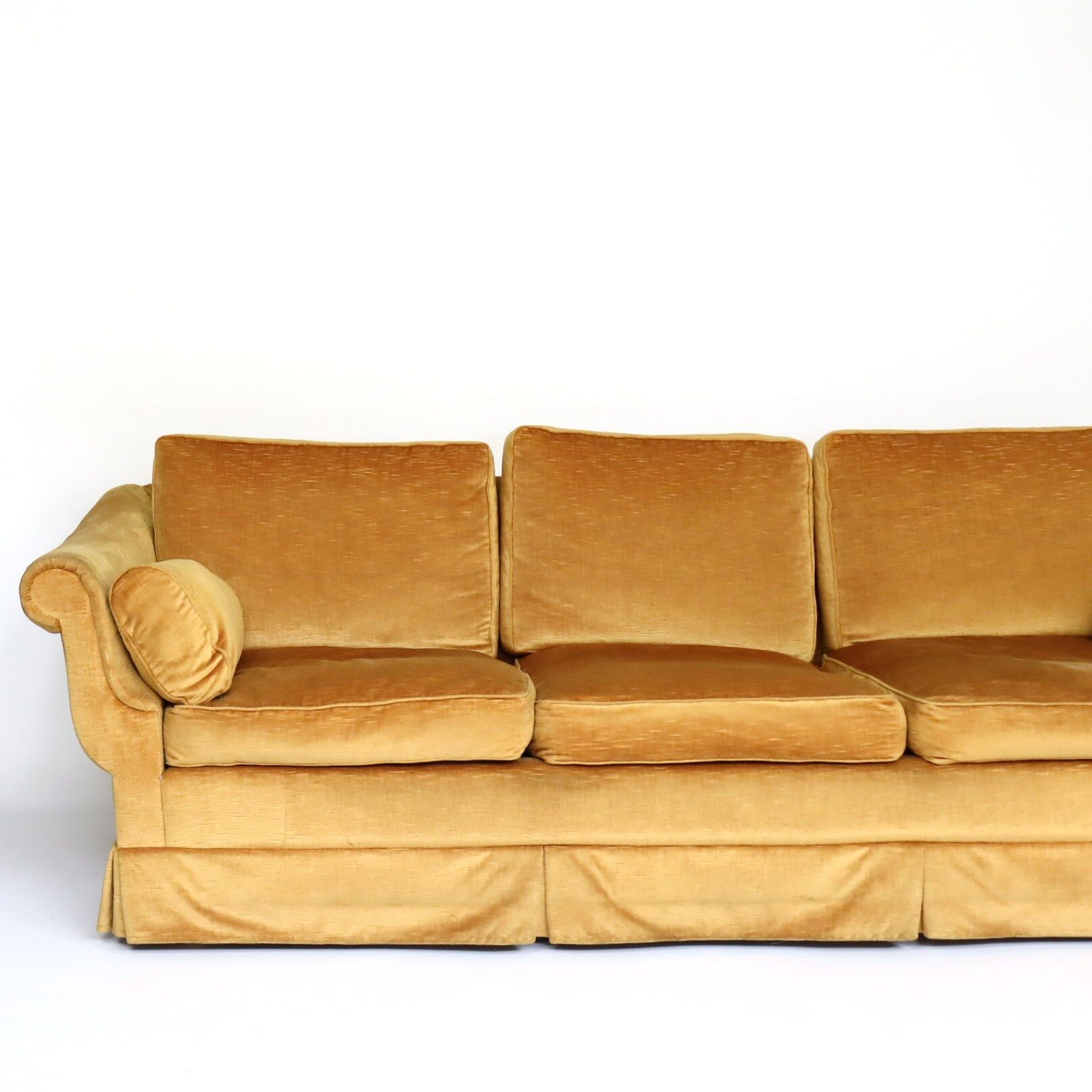Three-seater velvet sofa
