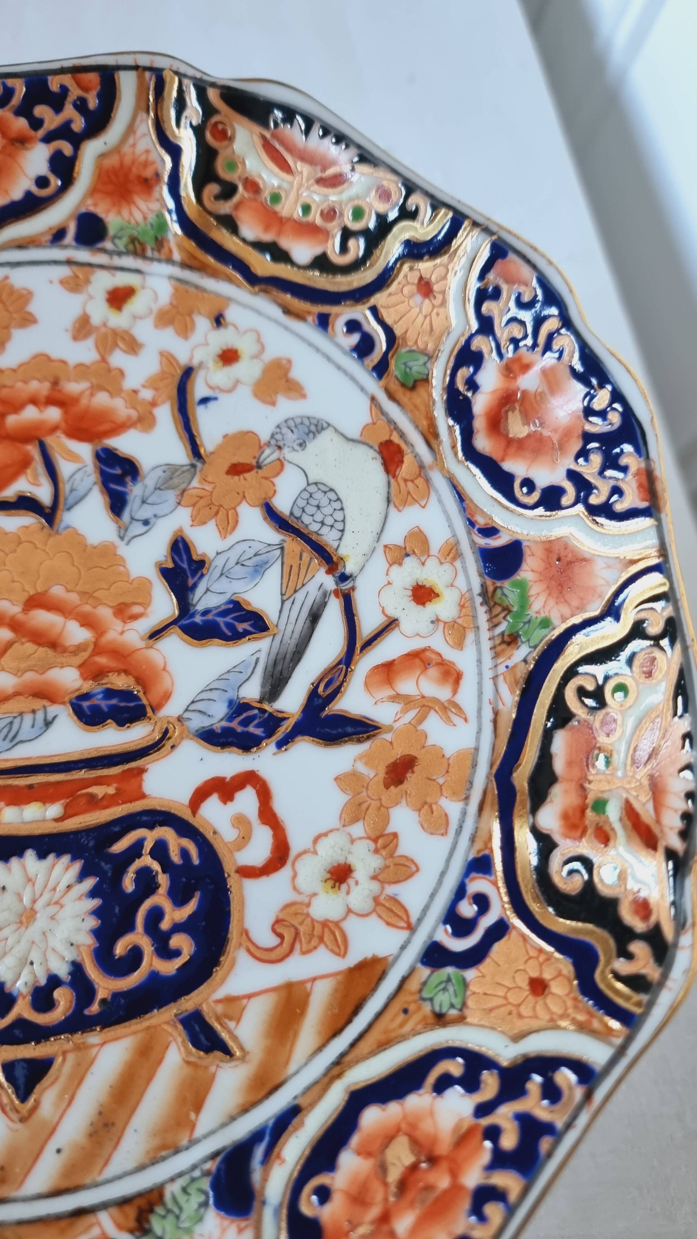 Imari-style porcelain plate, hand-painted, Japan, mid-20th century.