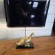 Pair of brass duck lamps from the 70s