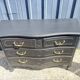 Louis XV style black lacquered chest of drawers with four drawers.