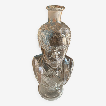 Napoleon III molded glass bottle