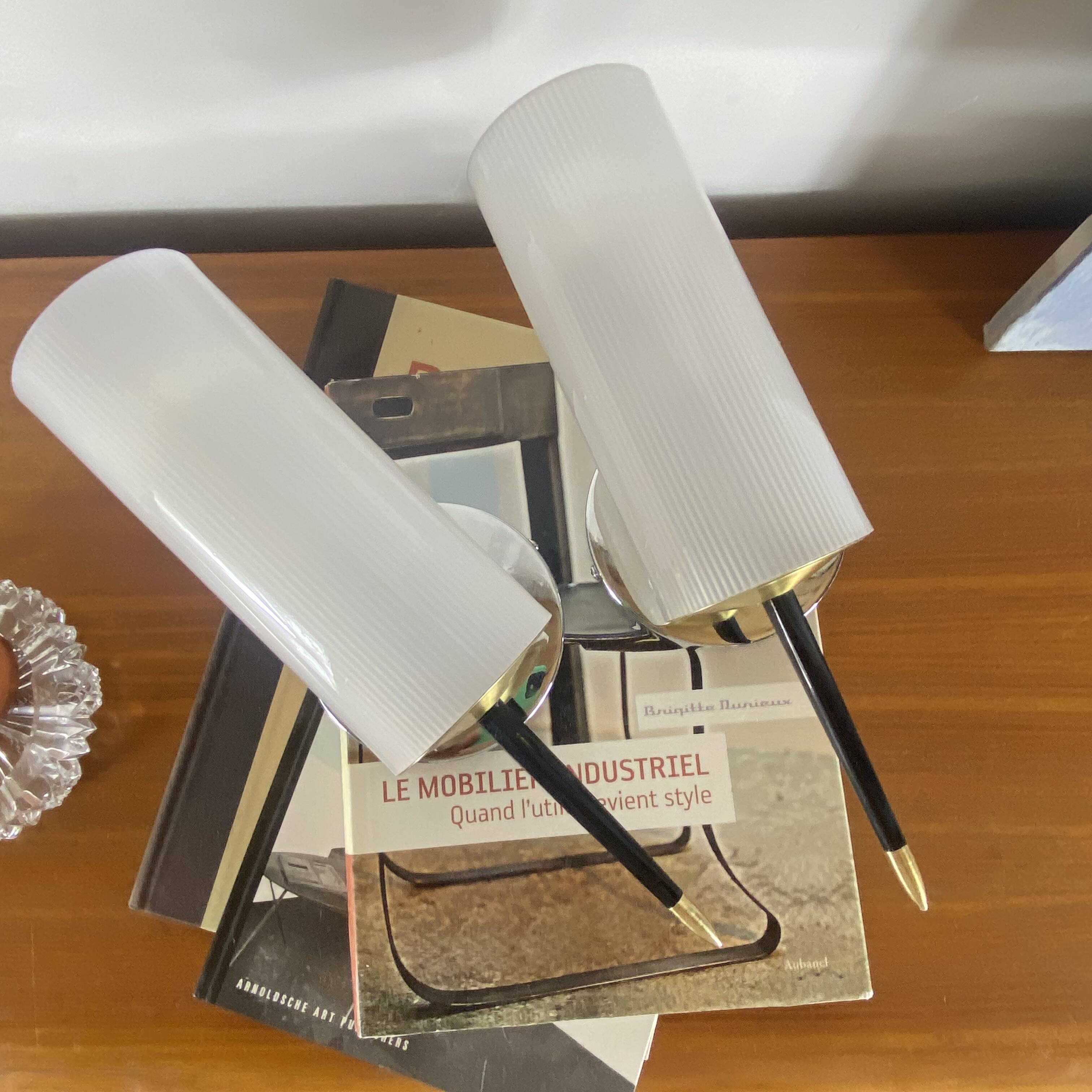 Pair of vintage wall sconces in plexiglass plastic and brass.