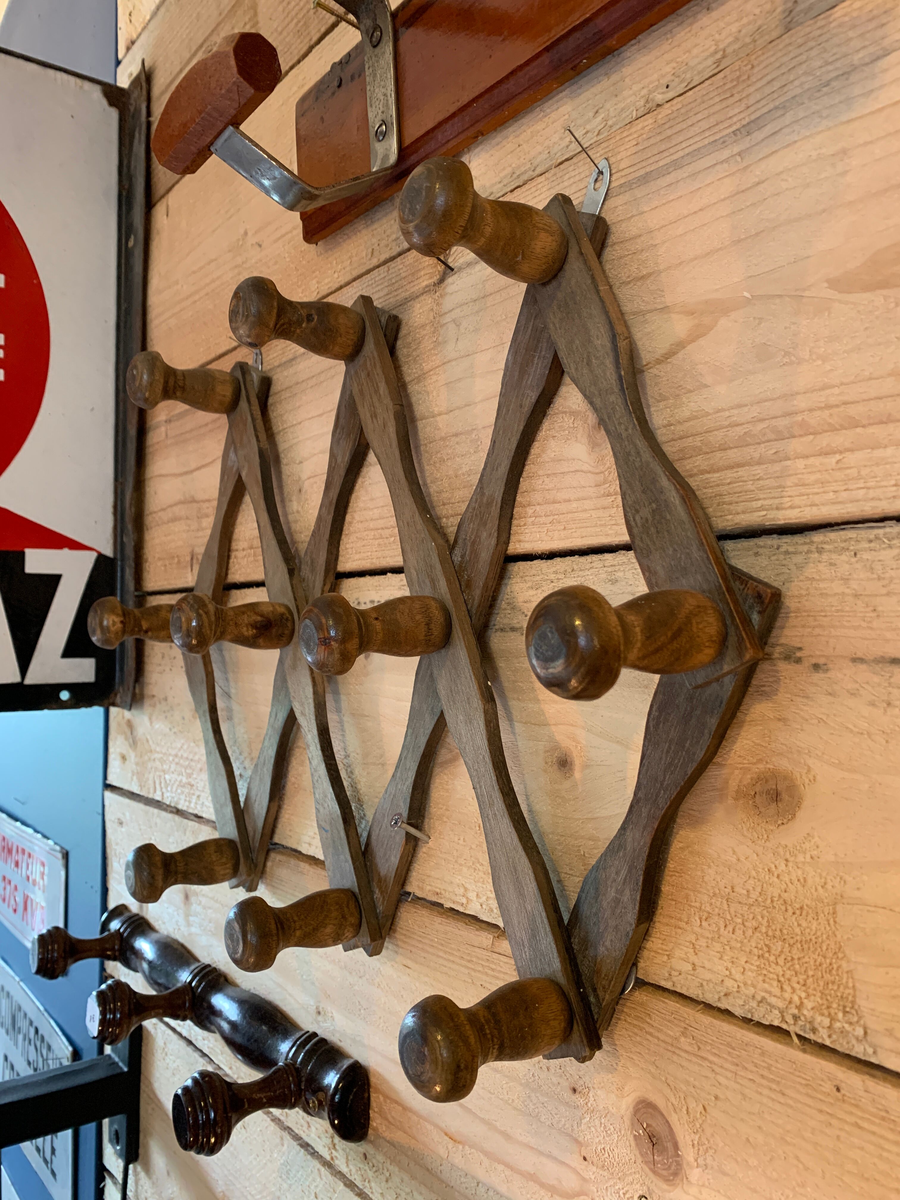 Accordion wall coat holder