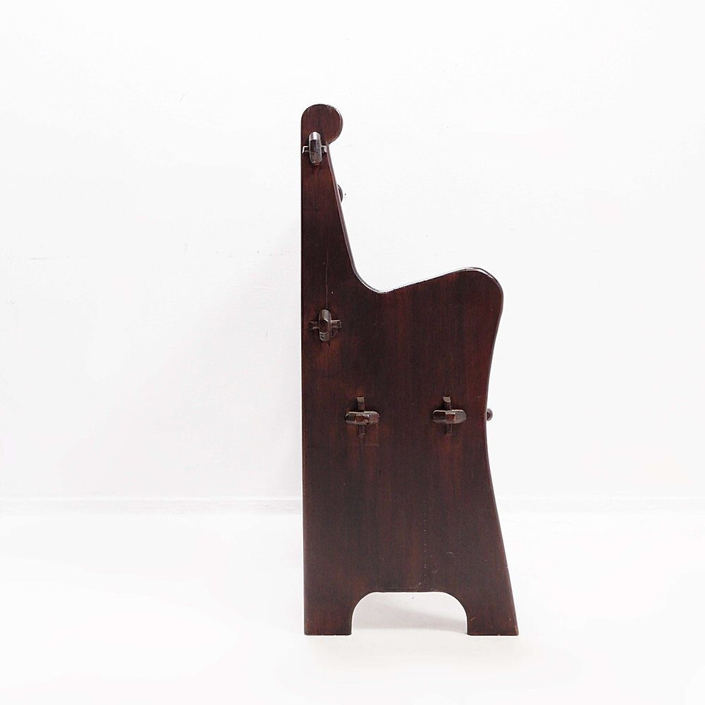Vintage solid wood church bench from the 20th century.