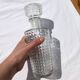 Old relief glass carafe with stopper