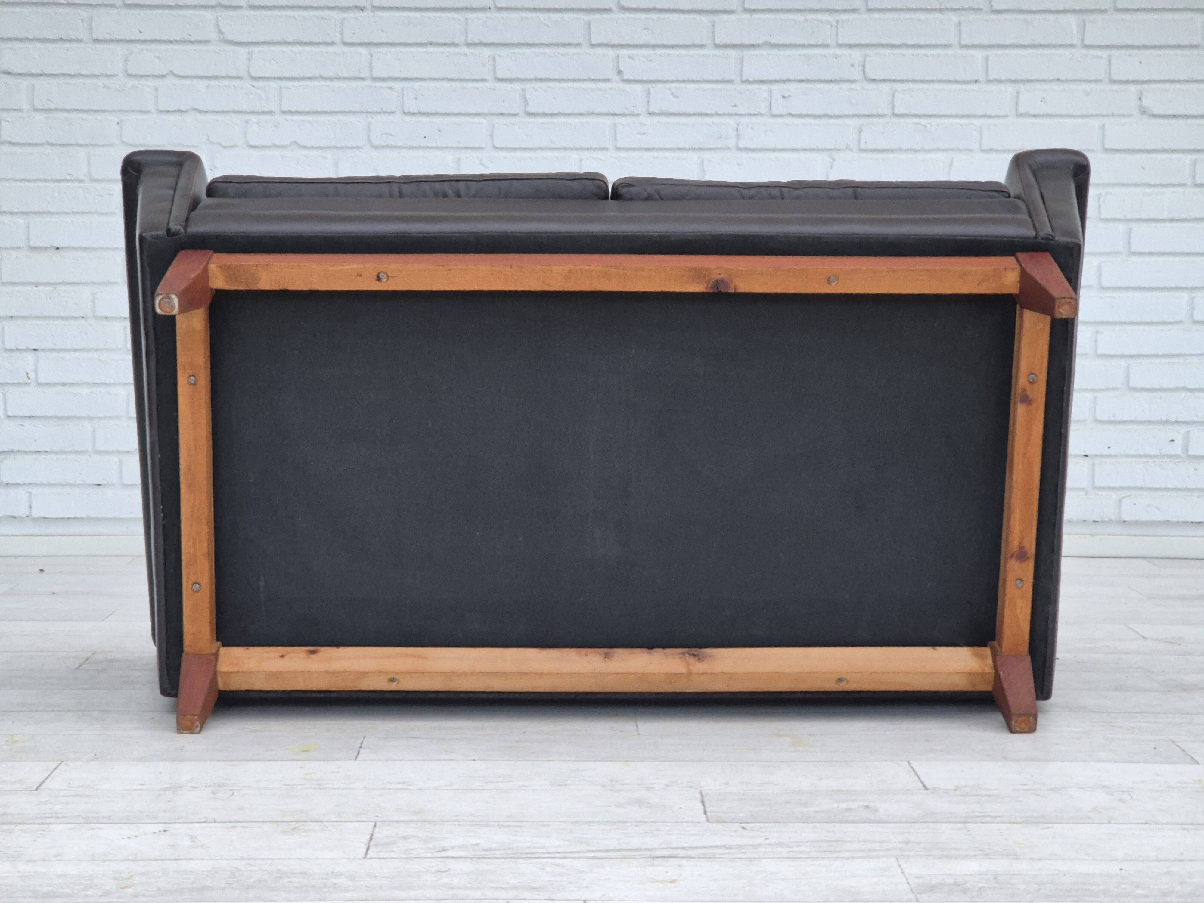 1970s, Danish 2 seater sofa, original condition, furniture leather, solid teak wood.
