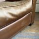 Vintage club armchair in brown fabrics to restore
